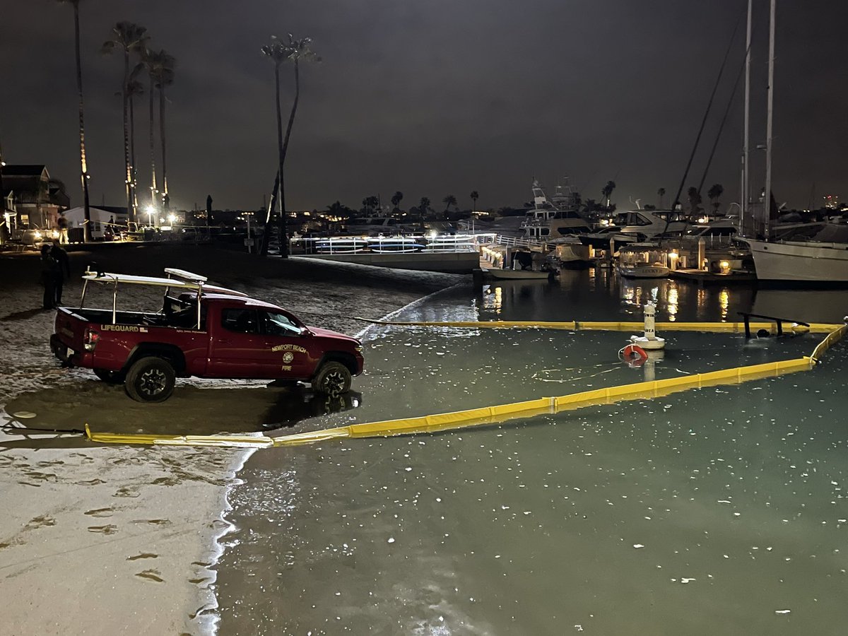 All that's visible of the Huntington Beach helicopter that crashed in Newport Beach around 6:30 pm Saturday night