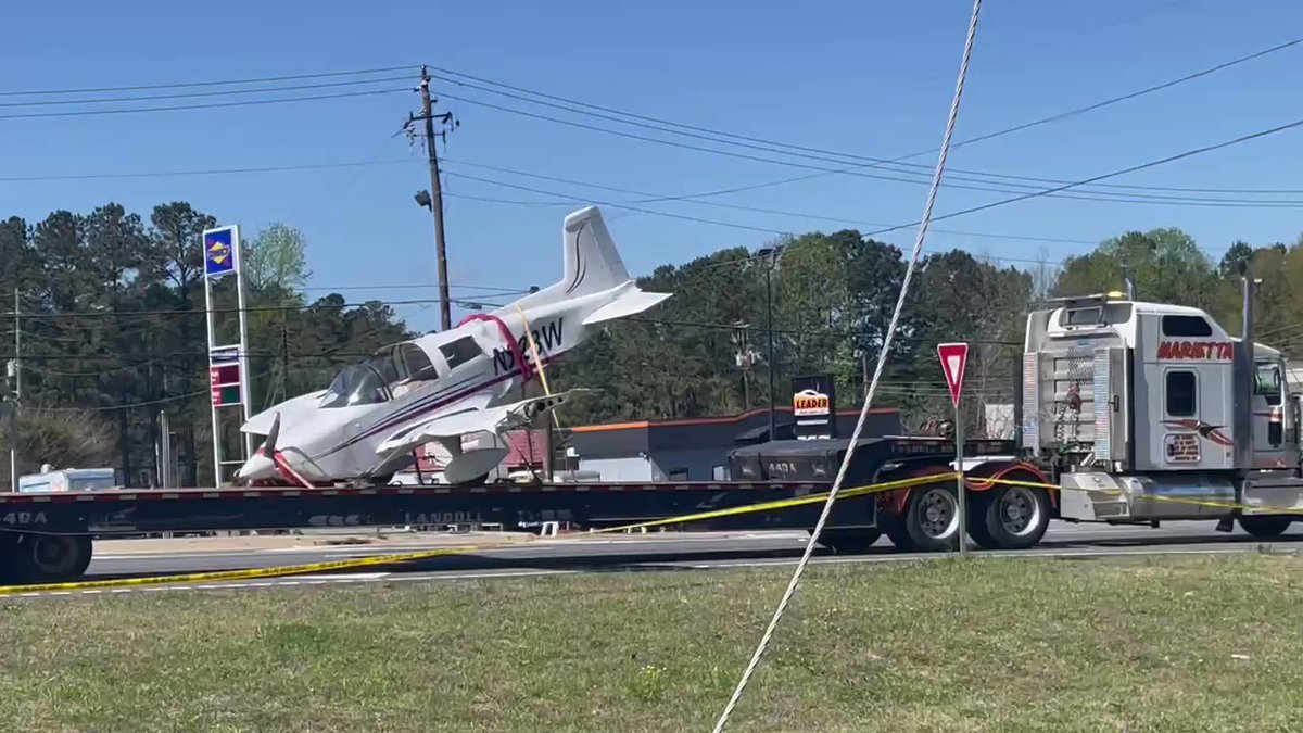 Small two seater plane just went down on Cobb Parkway less than an hour ago. Pilot's engine failed, he tried to turn around & go back to Cobb International Airport, but crashed. Pilot was able to walk away on both feet