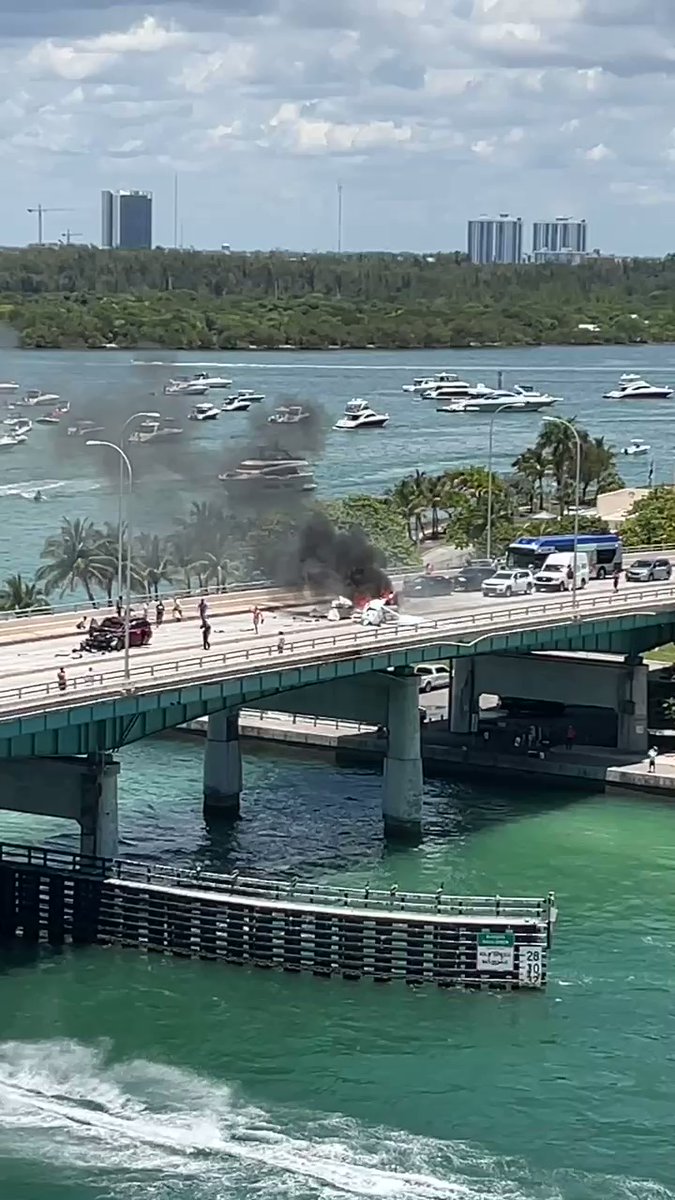 Small plane crashes onto bridge near Miami, hitting at least 1 car; reports of multiple victims