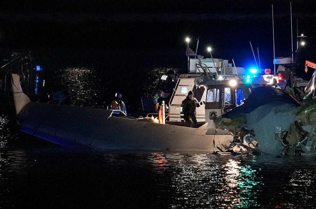 Photos appear to show a plane wing and part of the fuselage in the Potomac River.Credit: Andrew Harnik/Getty Images