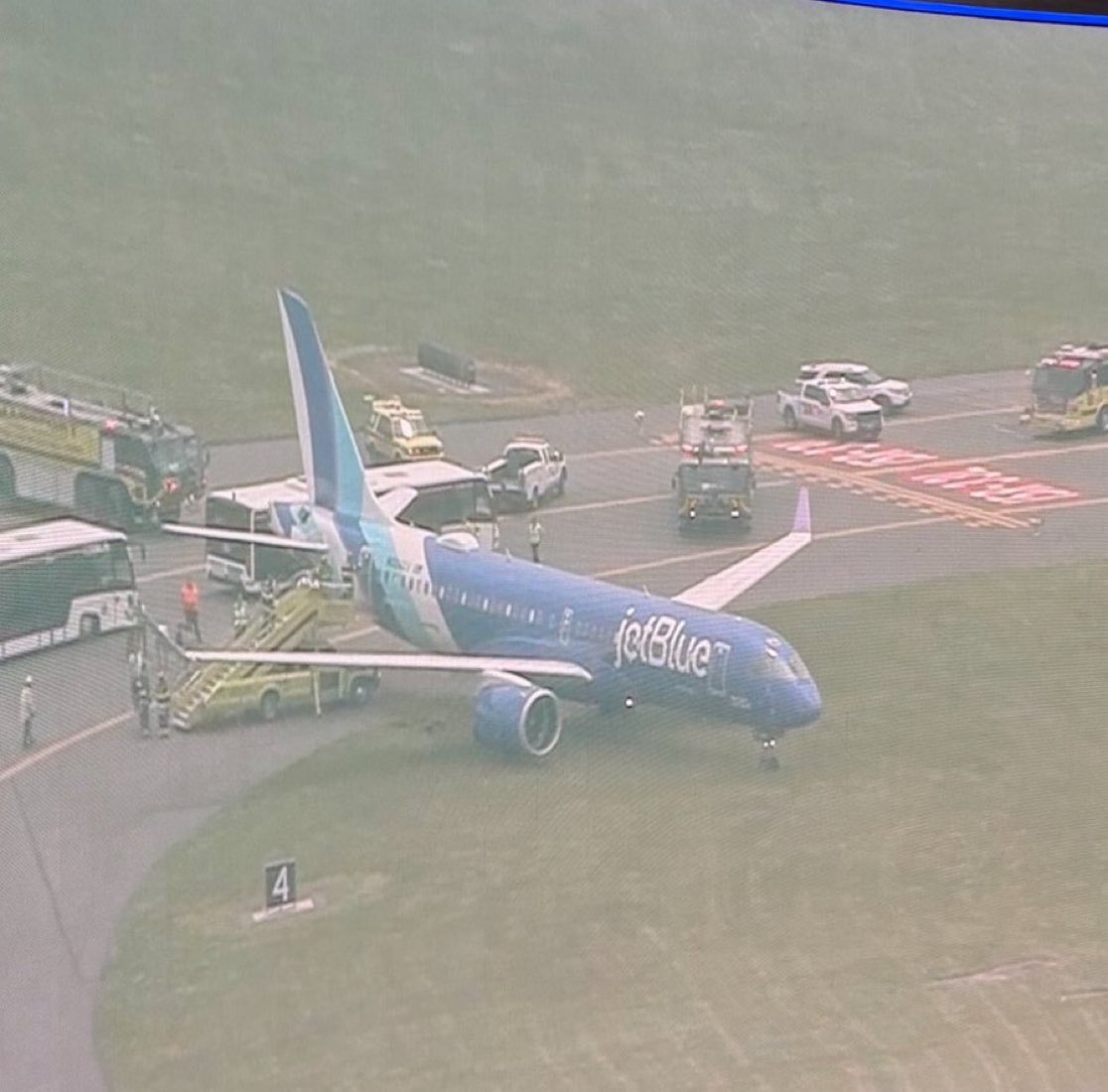 JetBlue Flight 312 from Chicago veered off the runway and came to a stop on the grass at Boston Logan Airport